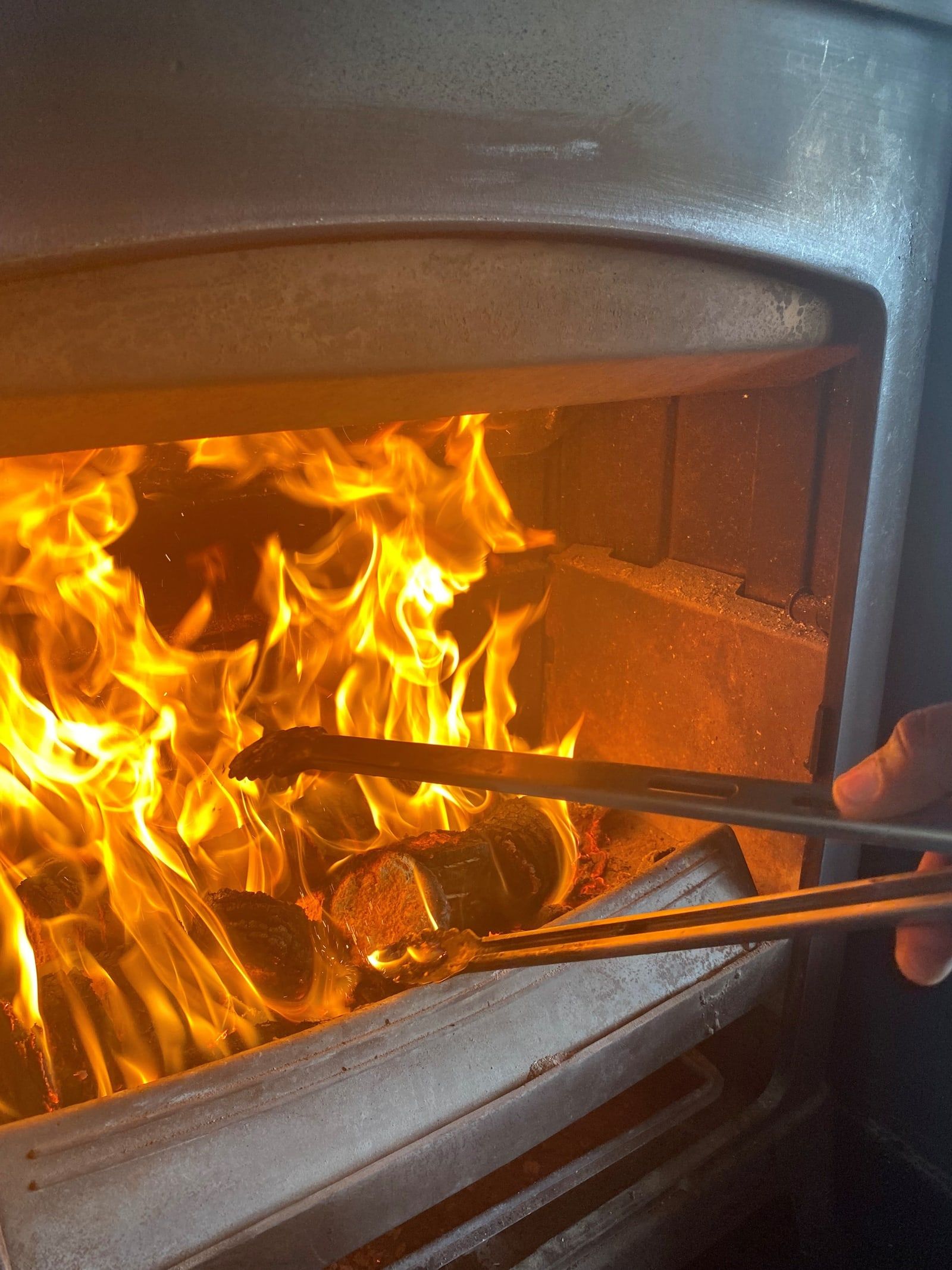Eco logs burning brightly in a wood stove